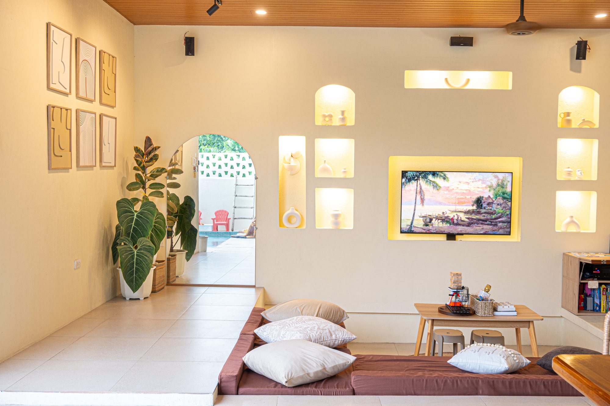 Sunken living room with gallery wall