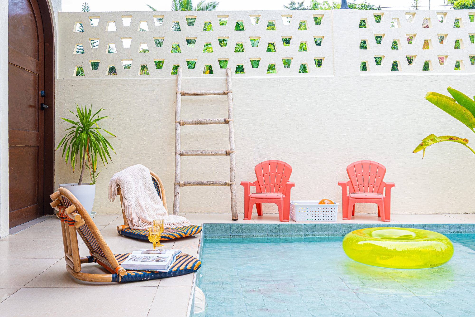 Poolside lounge chairs at Casa Dapyo