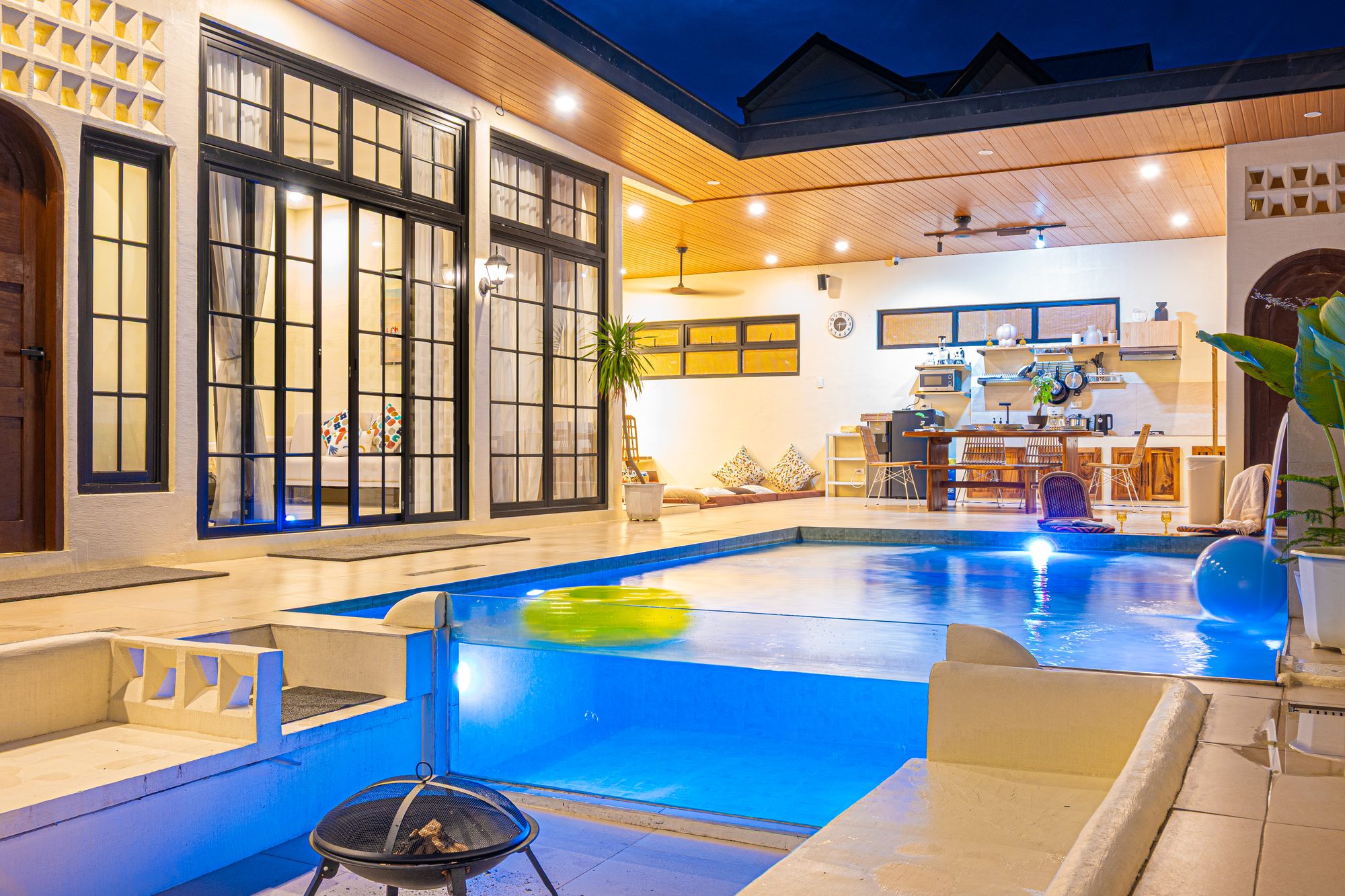 Casa Dapyo pool lit up at night